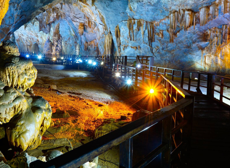 Ancient limestone stalactites and stalagmites inside Paradise Cave